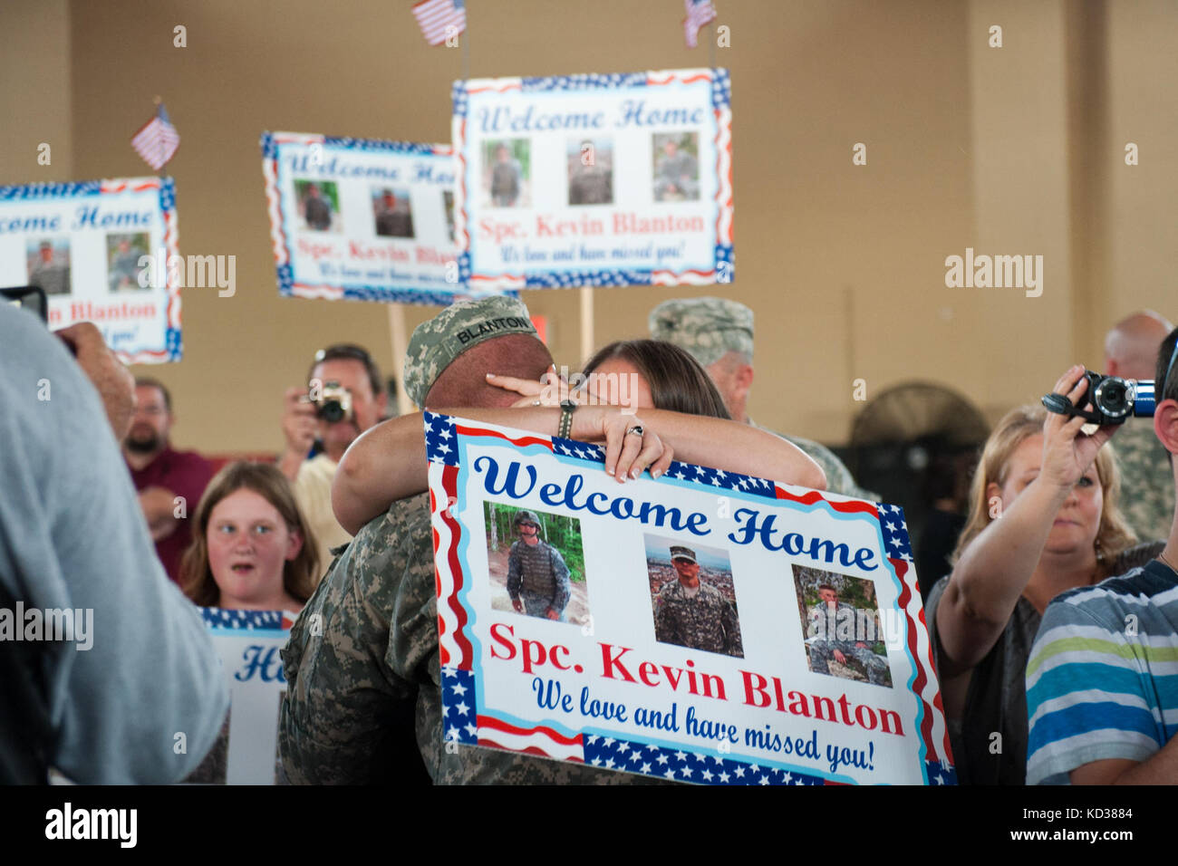 U.S. Army Soldiers with the 132nd Military Police Company, South Carolina Army National Guard, welcome home coming ceremony in the West Columbia Army National Guard Armory, S.C., June 4, 2013. The 132nd MP Company returns home after a nine-month deployment to Kosovo. The 132nd MP Company assisted in maintaining a safe and secure environment as part of Kosovo Force (KFOR) 16. (U.S. Air National Guard photo by Staff Sgt. Jorge Intriago/Released) Stock Photo