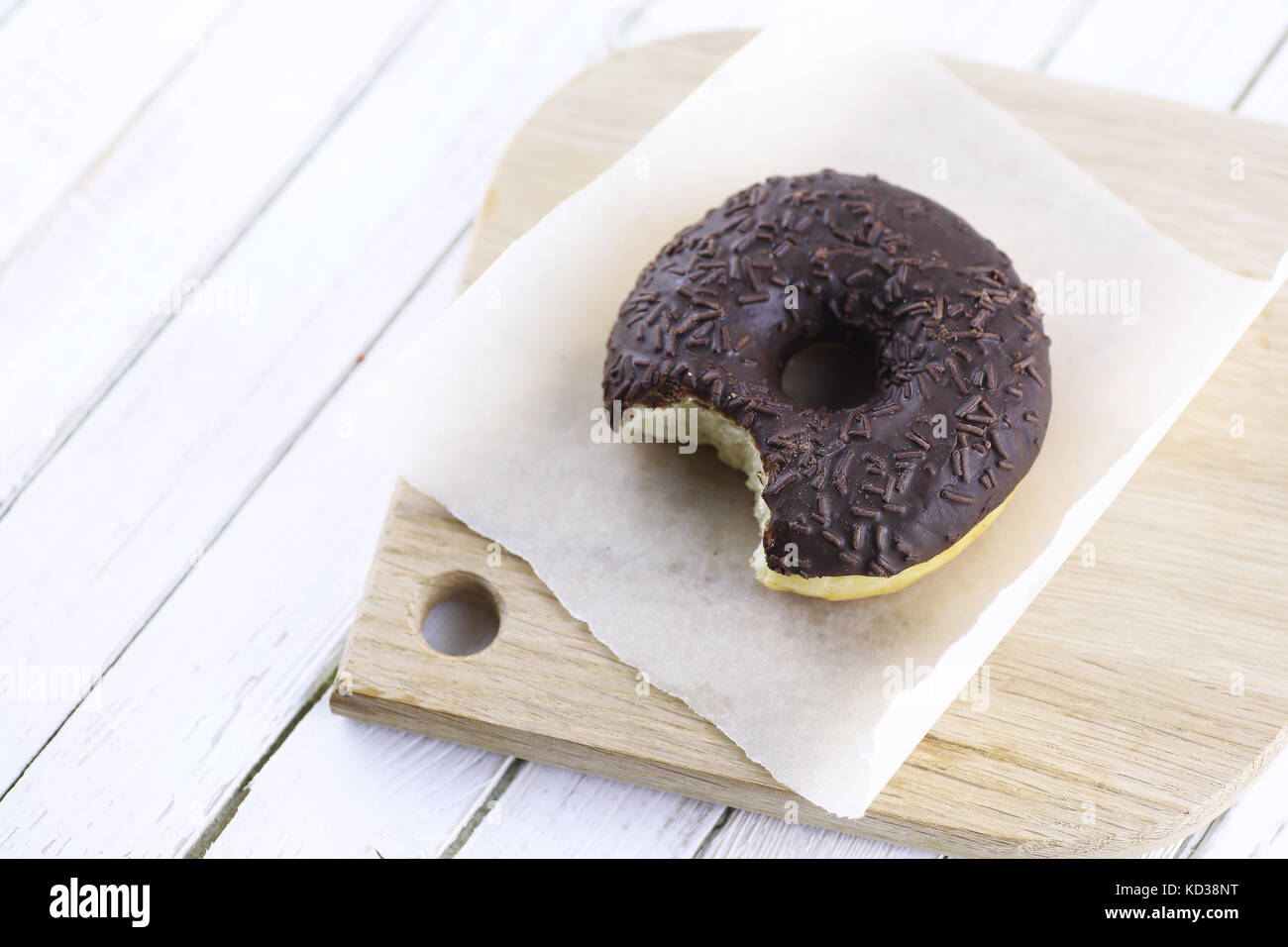 Chocolate Donut on a wooden white background Stock Photo - Alamy