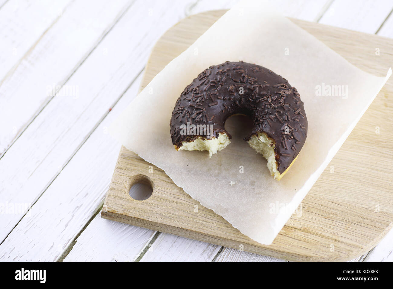 Chocolate Donut on a wooden white background Stock Photo - Alamy