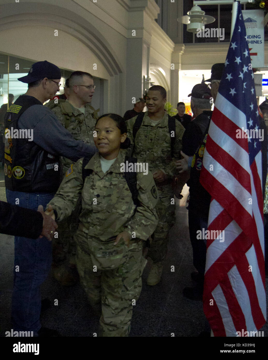 At Columbia Metropolitan Airport, a group of South Carolina National Guard Soldiers from the 351st Aviation Support Battalion return home on Nov. 15 from their deployment to Kuwait in time for the holidays. (U.S. National Guard photo by Sgt. Tashera Pravato 108th PAD/Released) Stock Photo