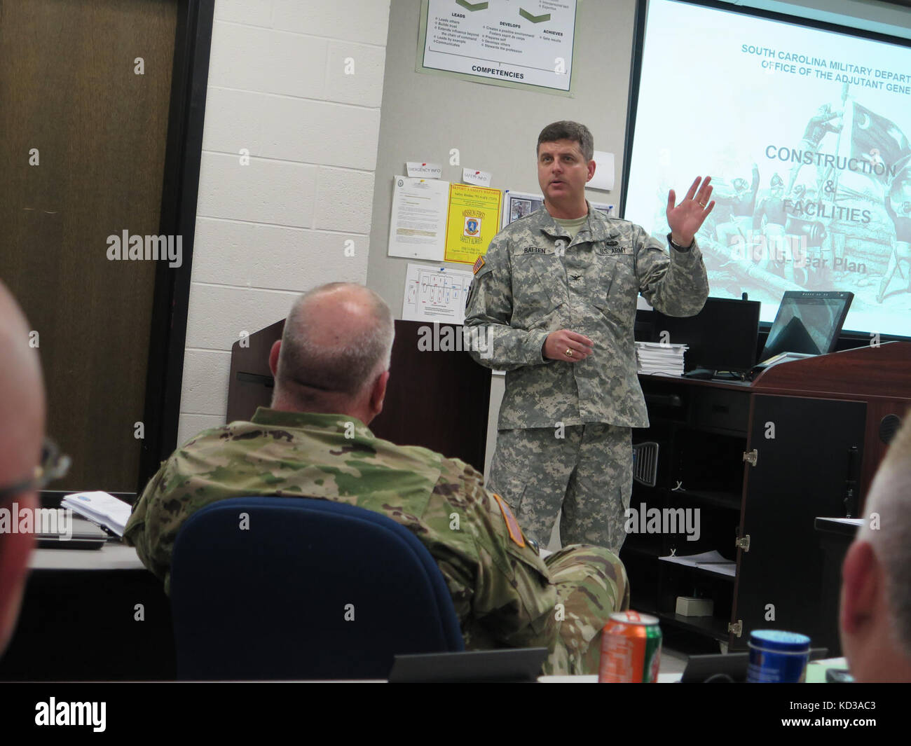 U.S. Army Col. Andrew Batten, director of facilities management, S.C. National Guard, provides an update on armories and facilities to participants in the 2015 S.C. National Guard Leaders Call held at the Soldier's Support Institute on Fort Jackson, Columbia, S.C., Dec. 12, 2015.  The annual gathering hosted by U.S. Army Maj. Gen. Robert E. Livingston, Jr., the adjutant general for South Carolina, provides a forum for leaders from brigade to company level in the organization to receive updates from key staff on the strategic plan and projections for missions, as well as discuss training and re Stock Photo