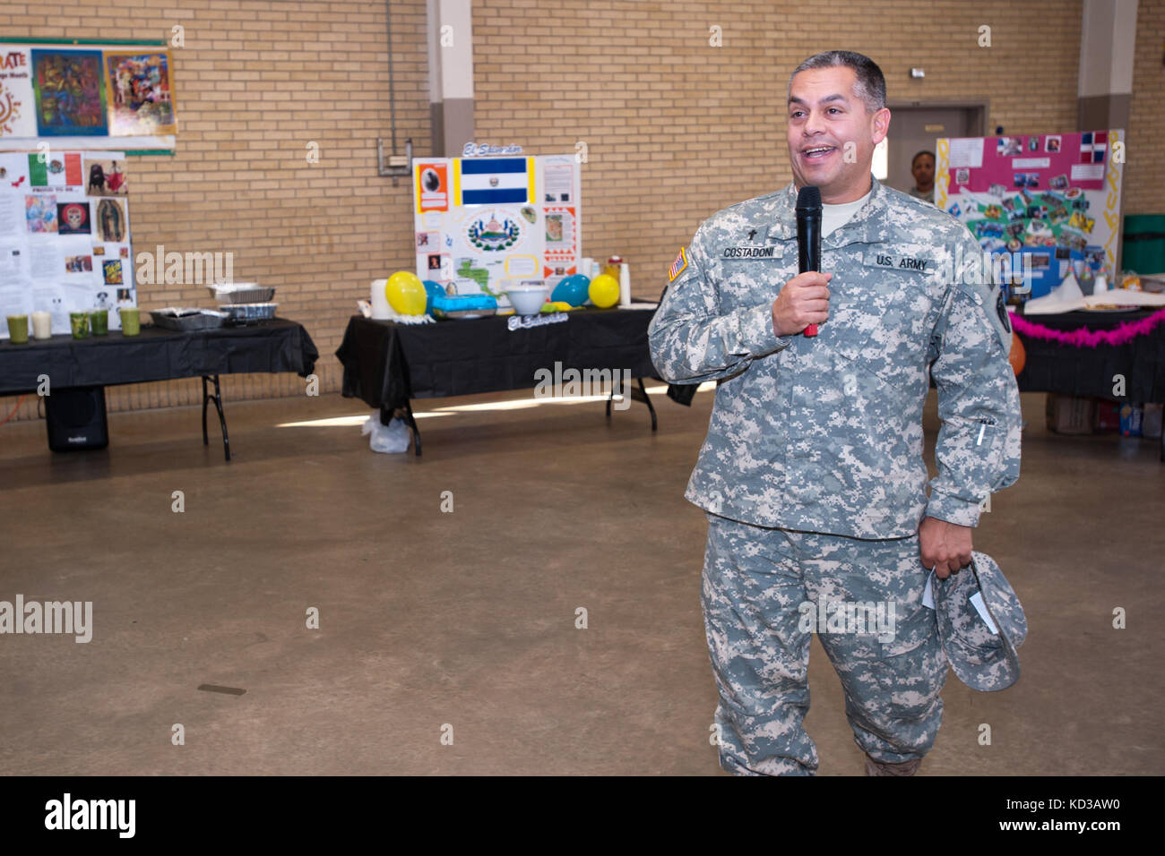U.S. Army and Air Force, South Carolina National Guardsmen, attend the Hispanic heritage month celebration hosted by the equal opportunity office alongside volunteers at the Bluff road Armory, Columbia, S.C., September 26, 2013.  The celebration included presentations and food from individual Latin American Countries. (U.S. Air National Guard photo by Staff Sgt. Jorge Intriago/Released) Stock Photo