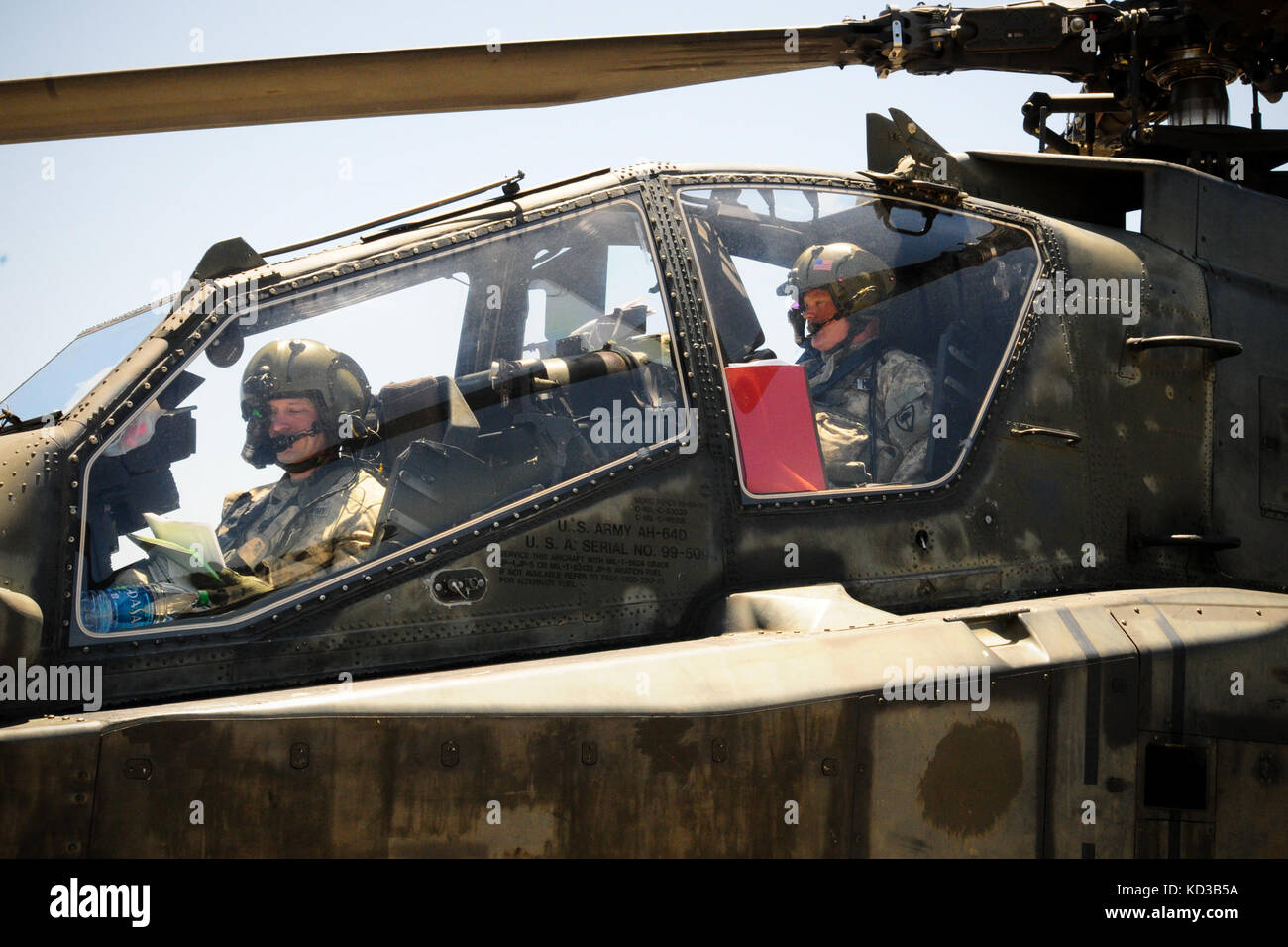 U.S. Army AH-64D Apache pilots assigned to S.C. Army National Guard’s 1/151 Attack Reconnaissance Battalion prepare to take-off at the forward arming and refueling point at Ft. Stewart, Ga., on May 4, 2014, to begin air-to-ground gunnery exercises as part of the unit’s annual training. Crews were tested with a variety of scenarios where they fired 30mm ammunition and point detonation rockets. (U.S. Army National Guard photo by. Sgt. Brian Calhoun/Released) Stock Photo