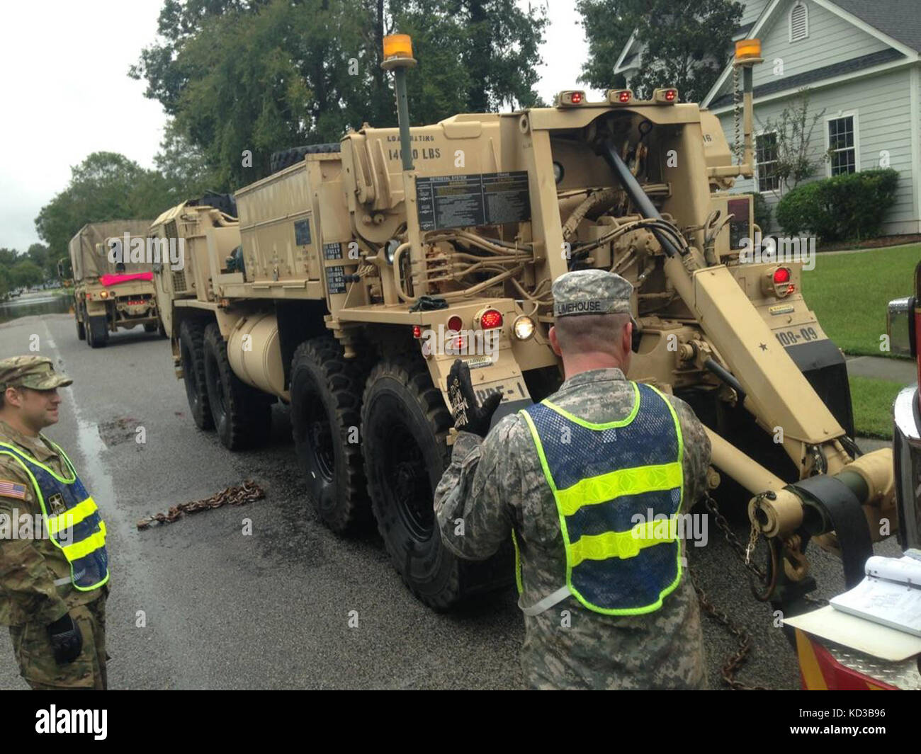 South Carolina National Guard Soldiers with the 108th Chemical Company and the 1-118th FSC assisted with the recovery of fire trucks in the Charleston, S.C. area during flood recovery operations Oct. 4, 2015. (Courtesy Photo) Stock Photo