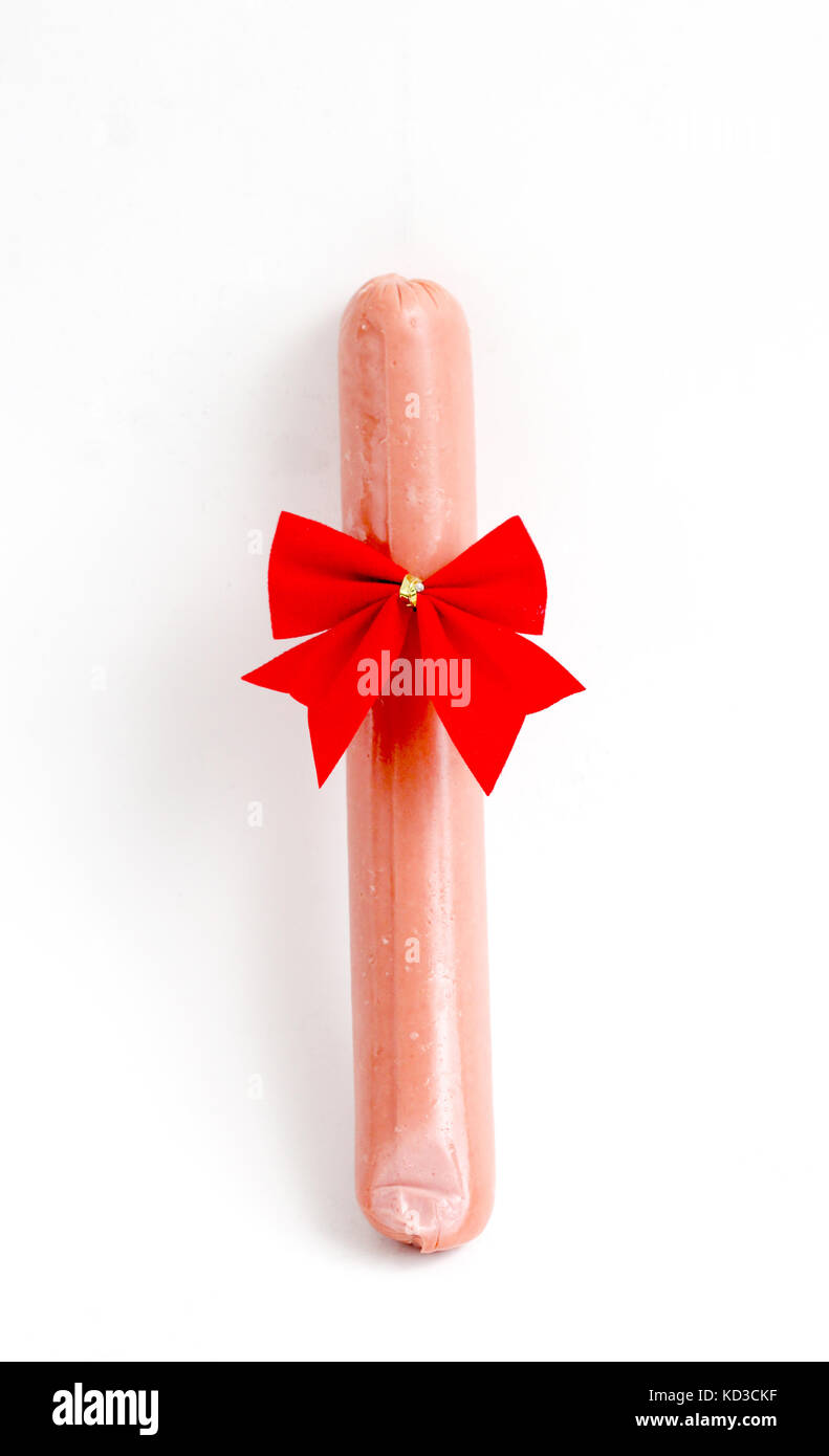 red ribbon bow-tie on a sausage on a white background Stock Photo - Alamy