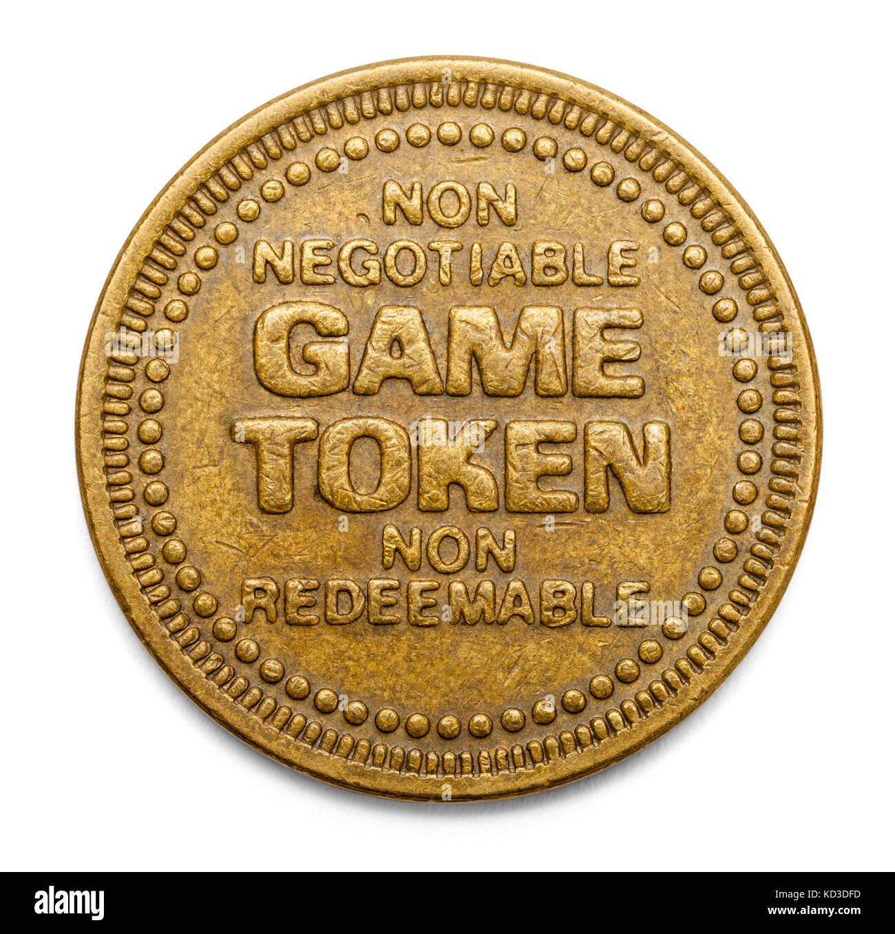 Arcade Video Game Token Isolated on White Background. Stock Photo
