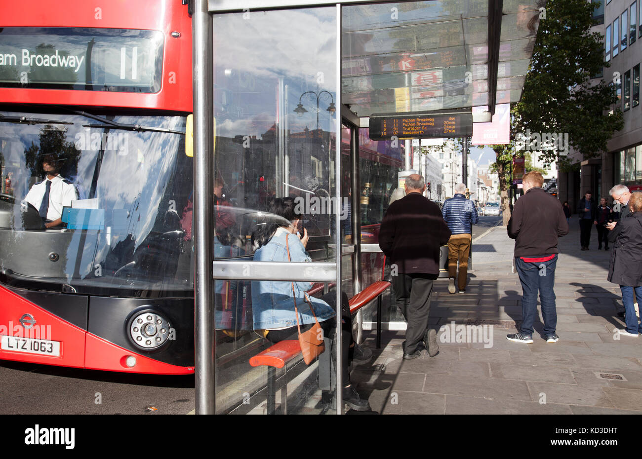 Bus Stop Uk London Woman High Resolution Stock Photography and Images ...
