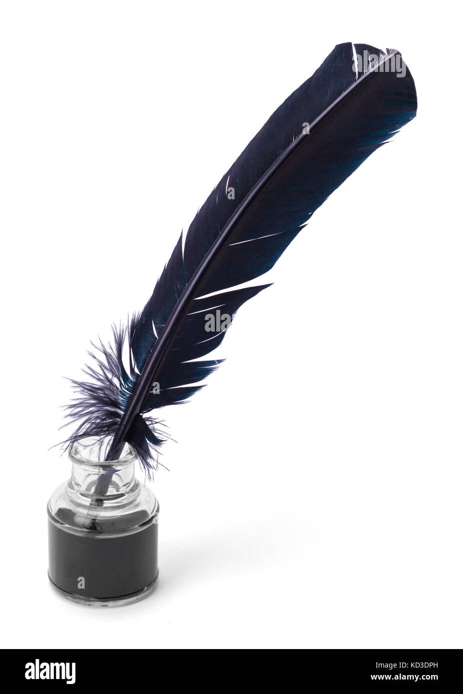 Black Feather Quill in a Glass Ink Jar Isolated on a White Background. Stock Photo