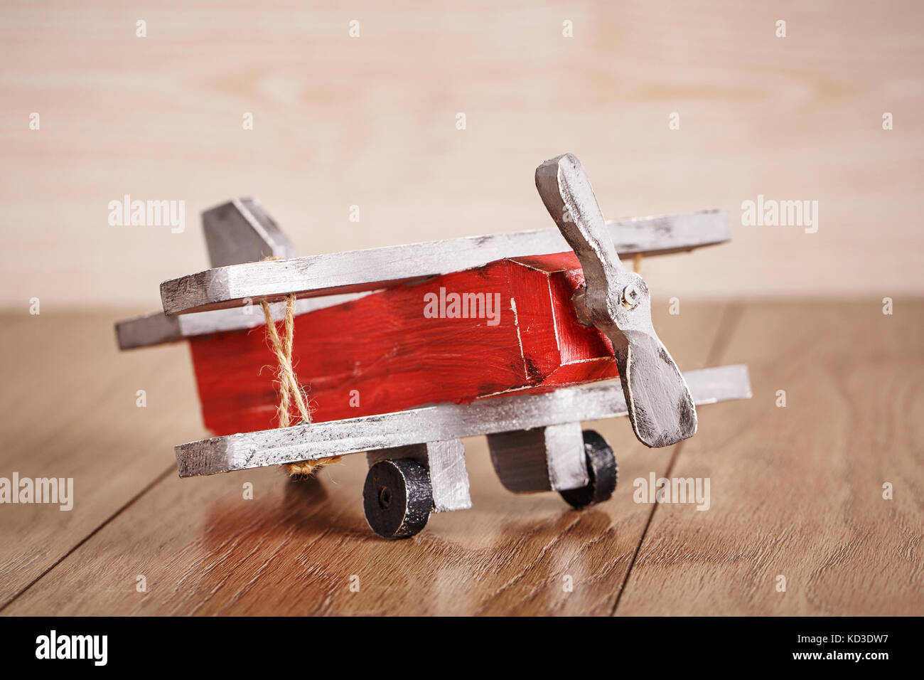 The toy for the child. Wooden plane designer. Stock Photo