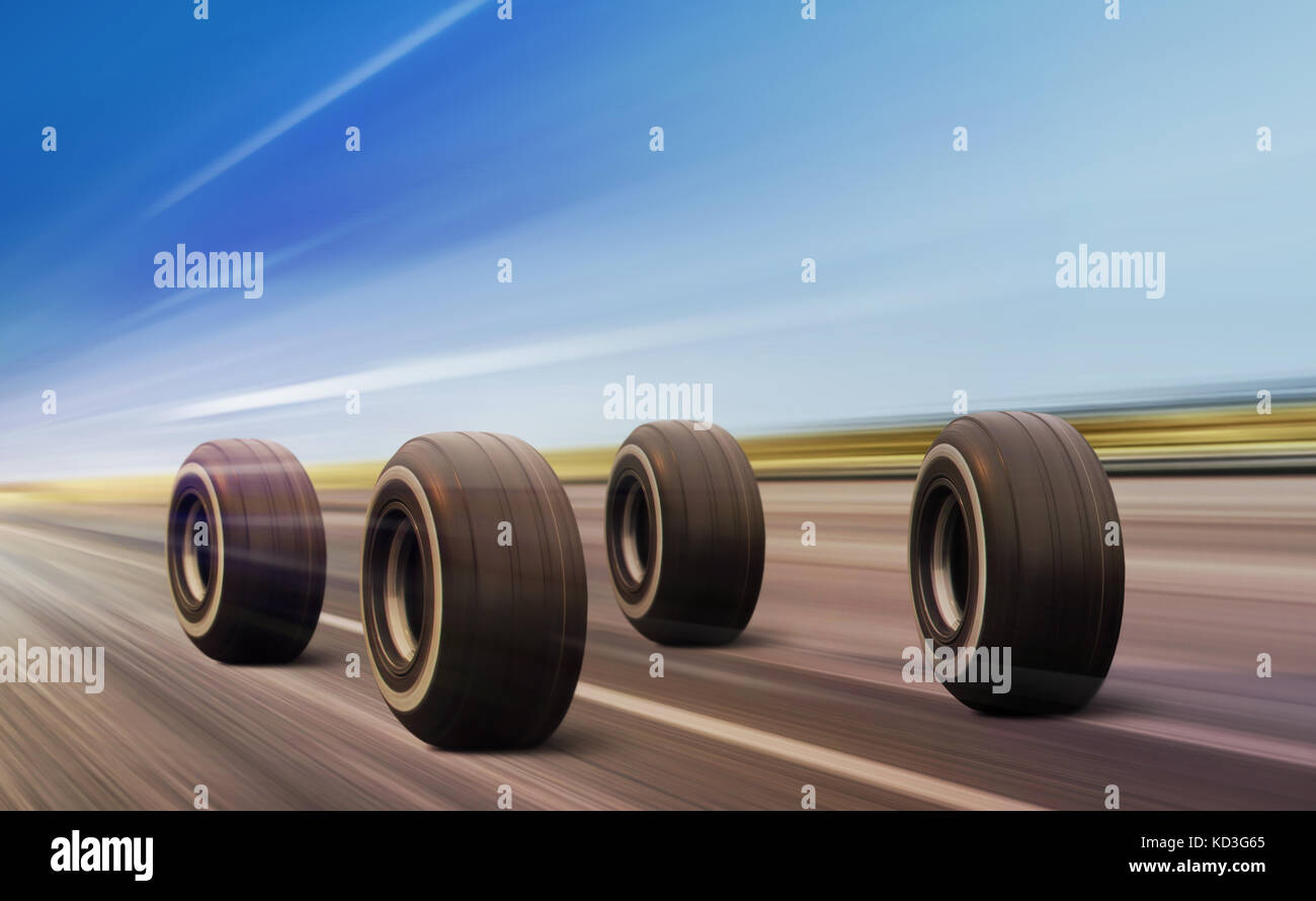 four automobile wheels moving on the road with high speed Stock Photo ...
