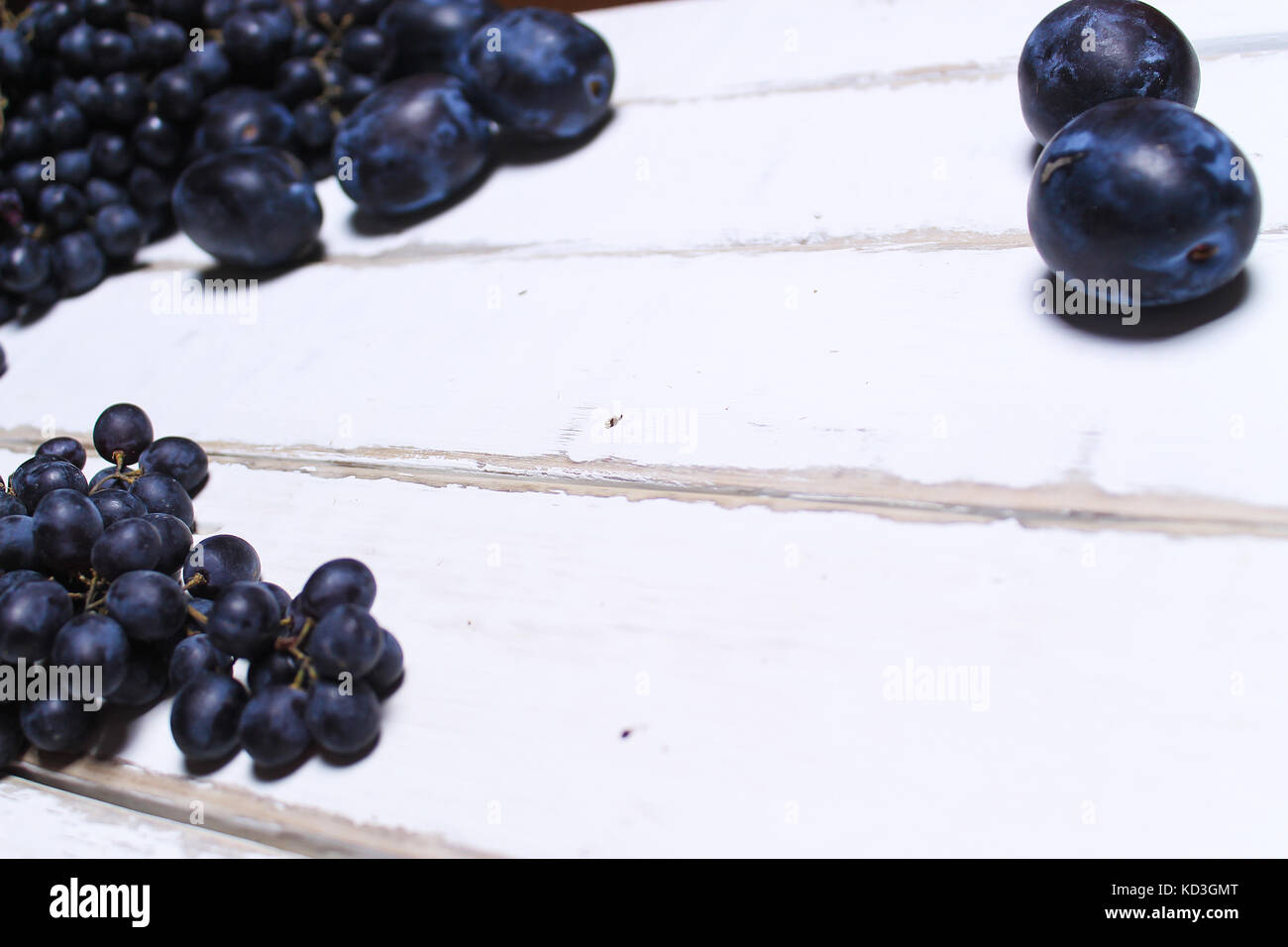 Fruits on a wooden table Stock Photo - Alamy