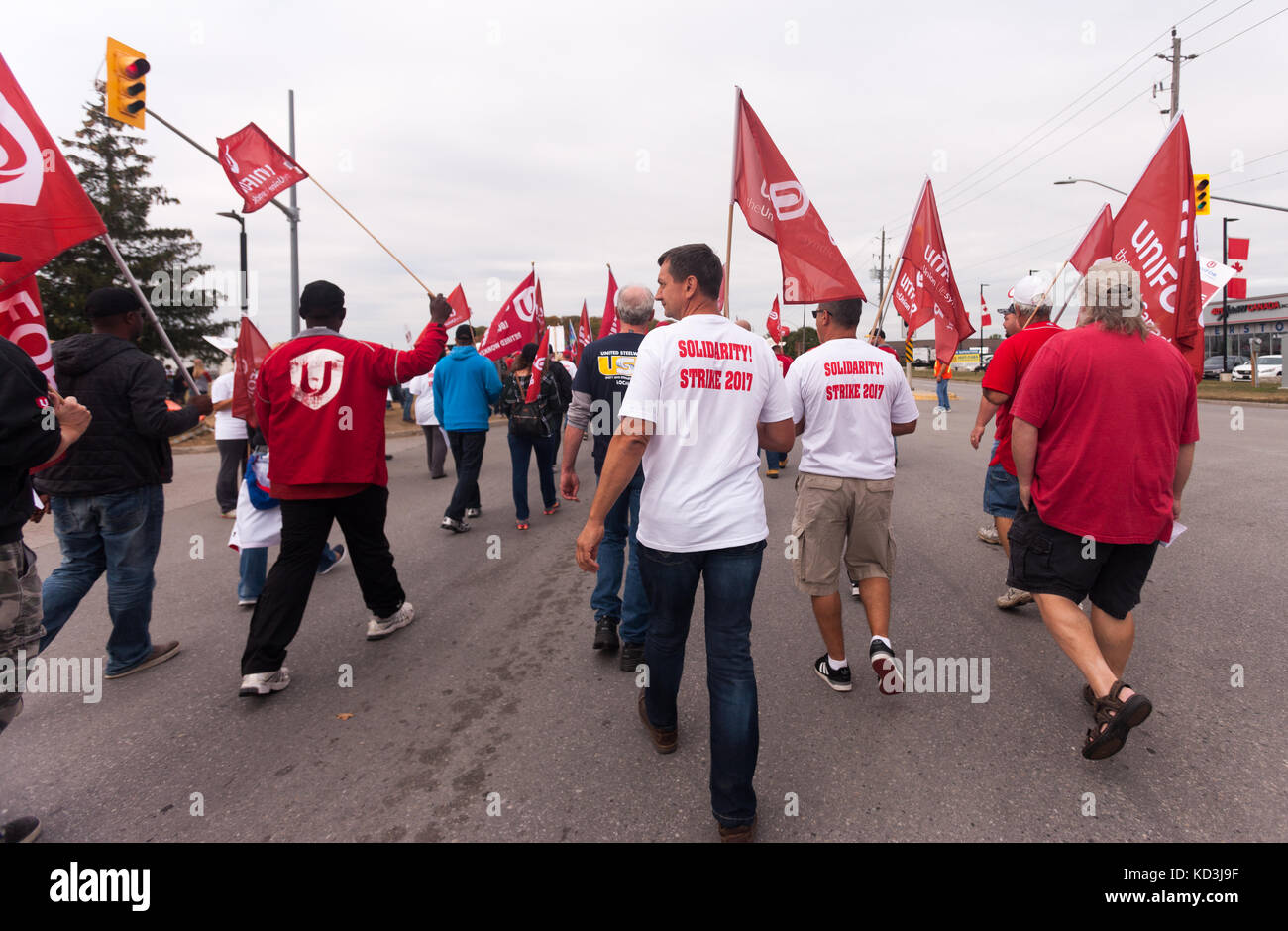 Unifor Local 88 members, their families and members of other unions participate in a solidarity rally in Ingersoll, ON, on Oct, 6, 2017. The workers h Stock Photo