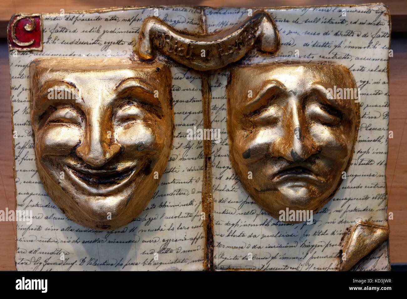 Masken mit unterschiedlicher Stimmung: heiter und ernst, Berlin-Chalottenburg. Stock Photo
