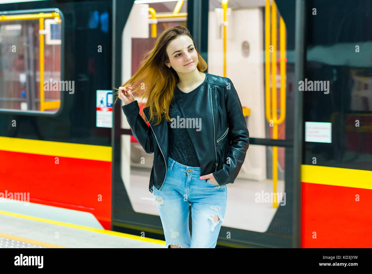 The girl near subway train Stock Photo - Alamy