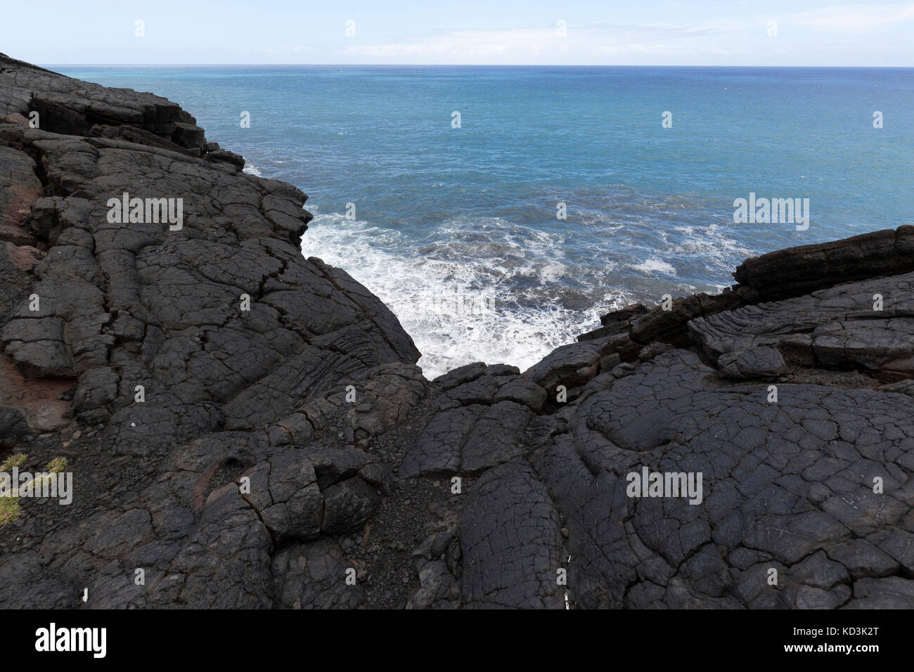 A view Oder the lava rock at the end of the Chain of Craters road in the Volcanoes National Park of Hawaii. Stock Photo