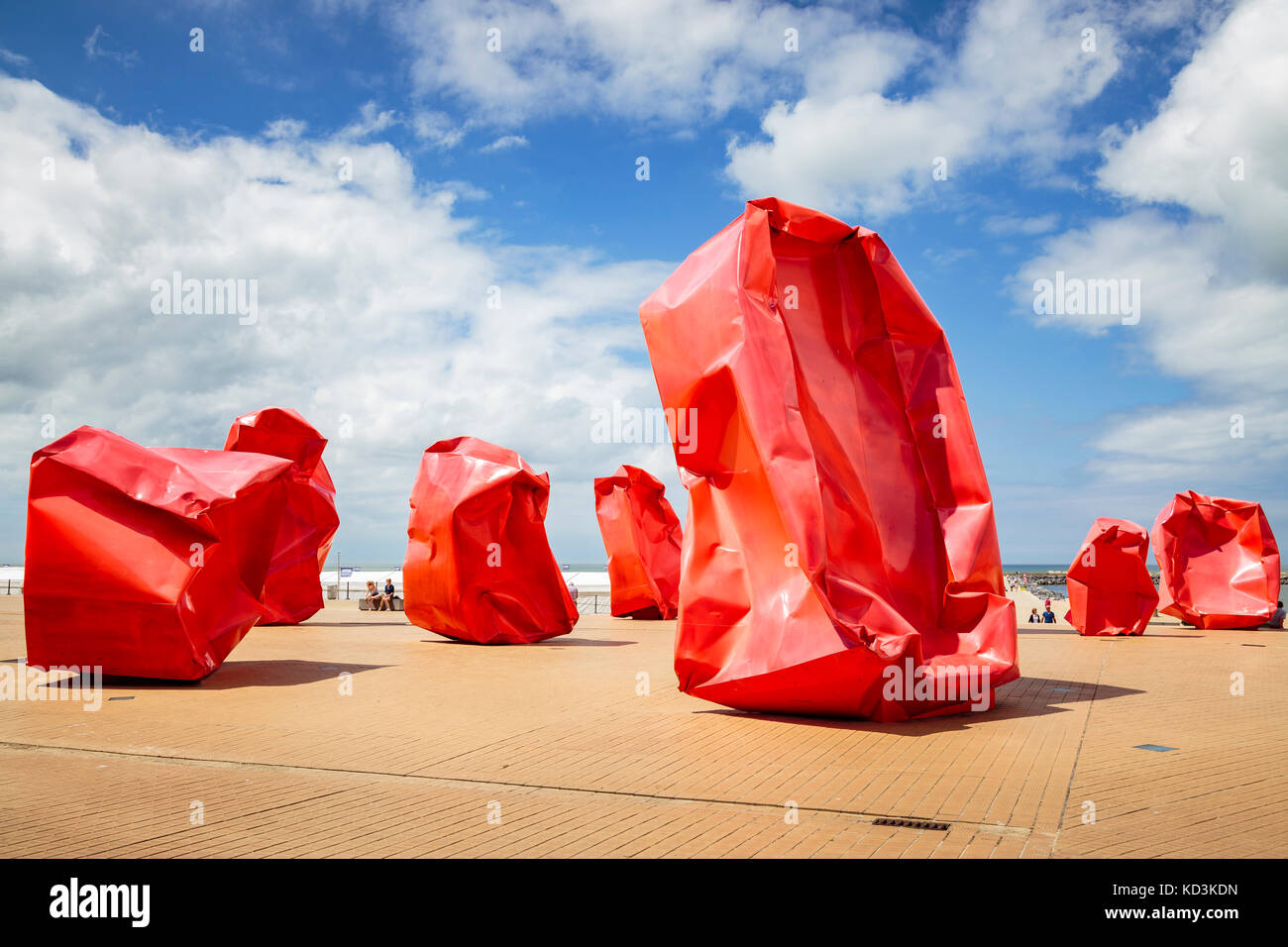 Wide picture of 'Rock Strangers' artwork in a sunny day with clouds. Oostende, Belgium. Stock Photo