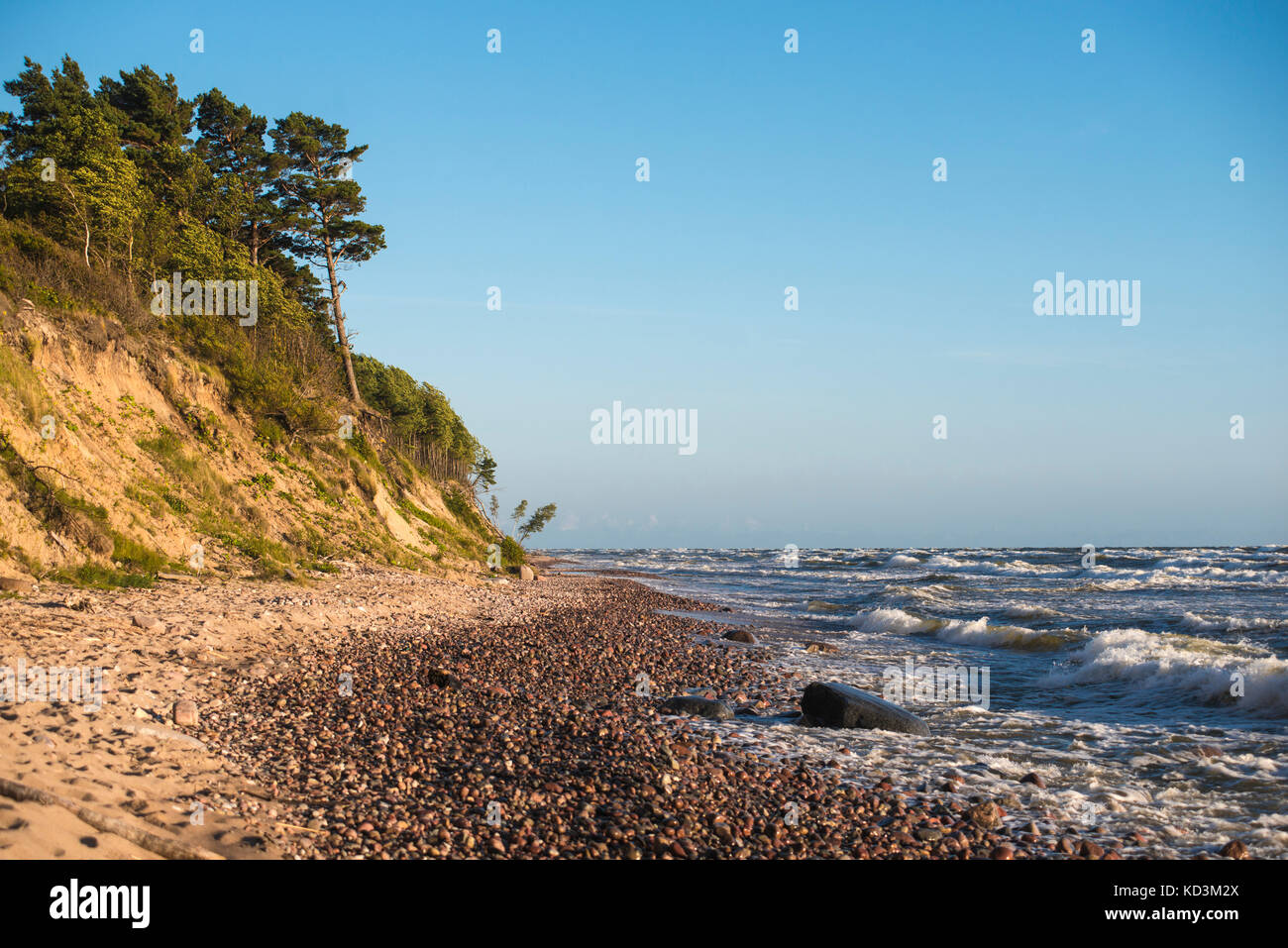 evening sea surfline on wild Baltic sea shore in Lithuania Stock Photo