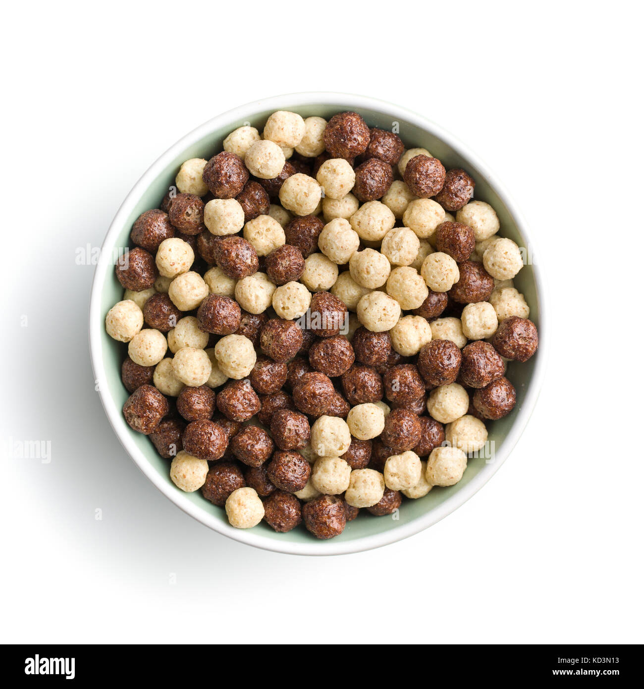 Breakfast cereal balls in bowl. Tasty breakfast. Chocolate cereals. Stock Photo