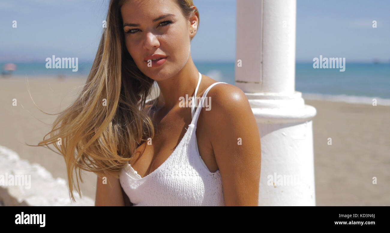 Wonderful model posing on beach Stock Photo - Alamy