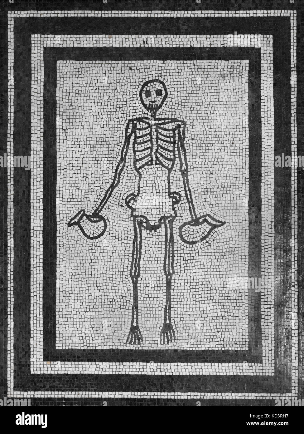 Naples. Italy. Roman mosaic of a skeleton holding two jugs (1st century A.D.), from Pompeii. Museo Archeologico Nazionale di Napoli.  Scheletro con du Stock Photo