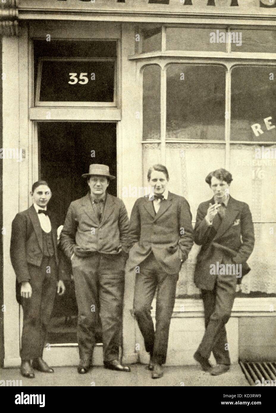 WARLOCK, Peter. (also called P. Heseltine) (c. 1915)  Left to right: unknown, Jacob Epstein (with hat), Peter Warlock   Evan Morgan. English composer and  musicologist (1894-1930) Stock Photo