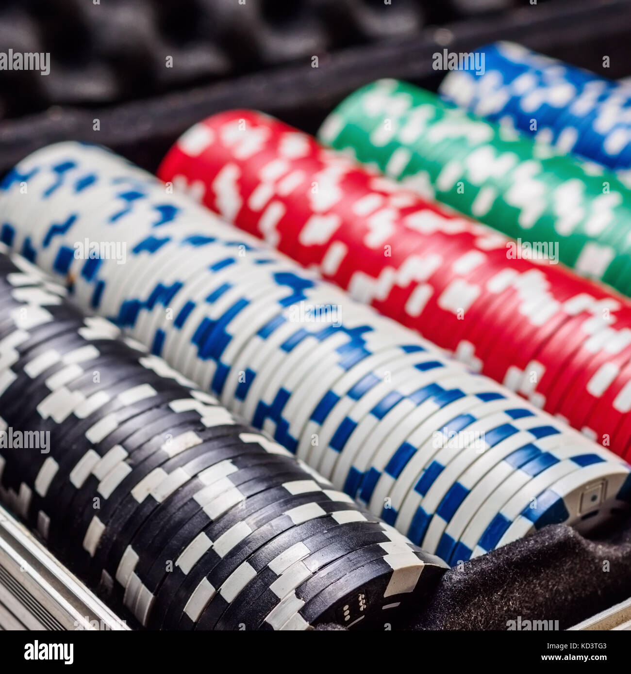 Set of poker chip or counter with card and dice in metal case Stock Photo