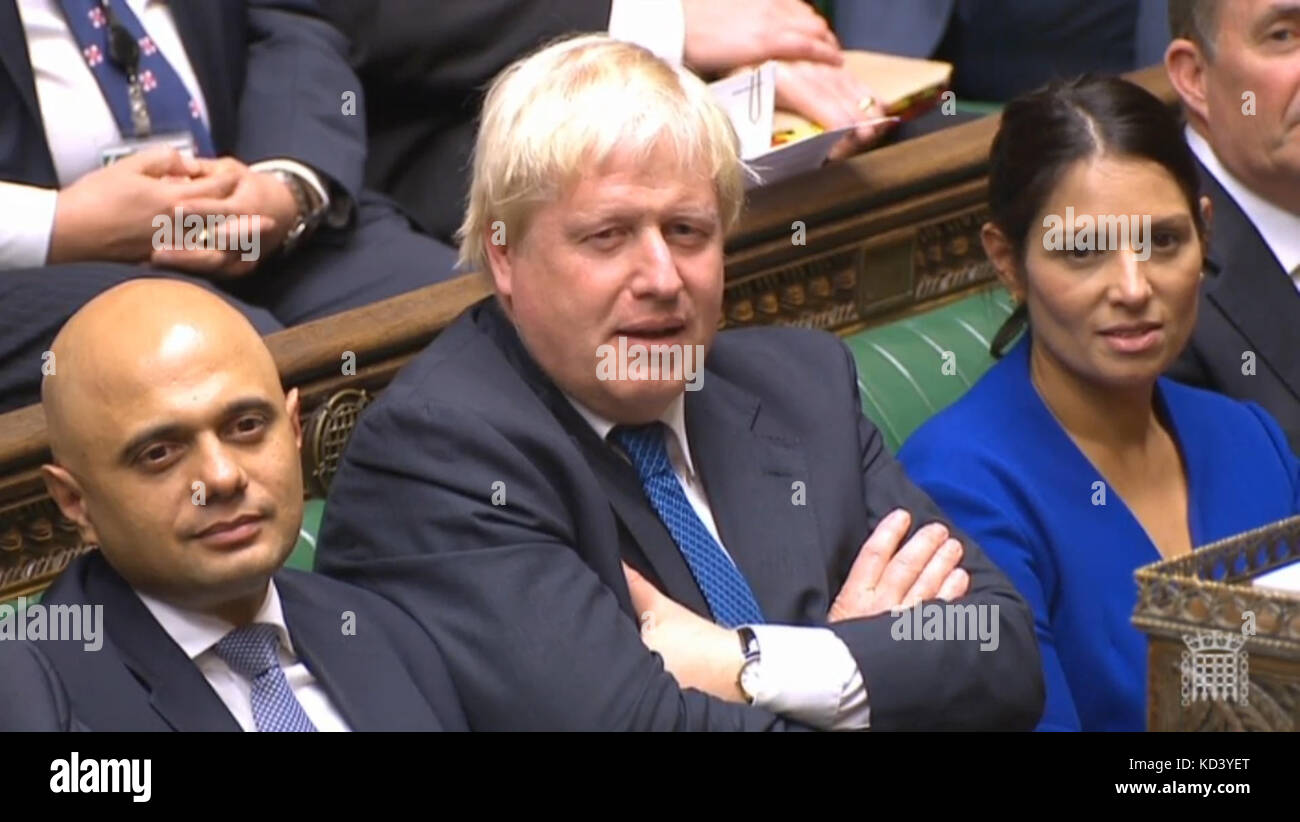 Foreign Secretary Boris Johnson listens as Labour leader Jeremy Corbyn responds after Prime Minister Theresa May updated MPs in the House of Commons, London on the Brexit negotiations since her Florence speech last month. Stock Photo