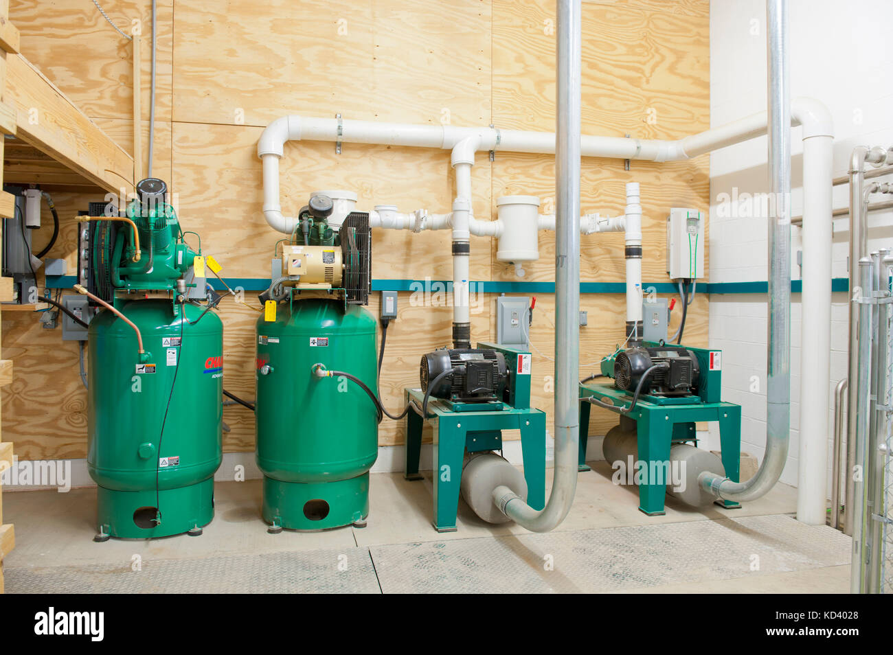 COMPRESSORS AND PUMPS AT AUTOMATED MILKING PARLOR Stock Photo