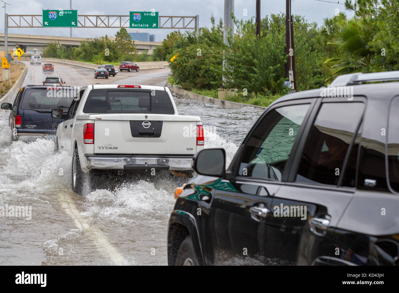 A truck pushes through floodwaters from hurricane Harvey. Heavy rains caused devastating flooding throughout the greater Houston area Stock Photo