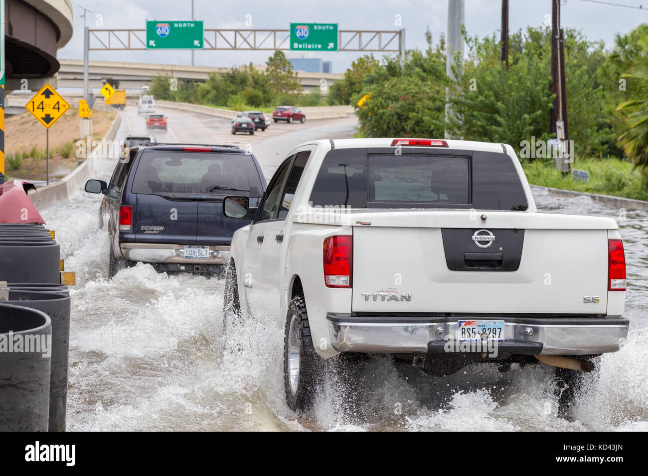 A truck pushes through floodwaters from hurricane Harvey. Heavy rains caused devastating flooding throughout the greater Houston area Stock Photo