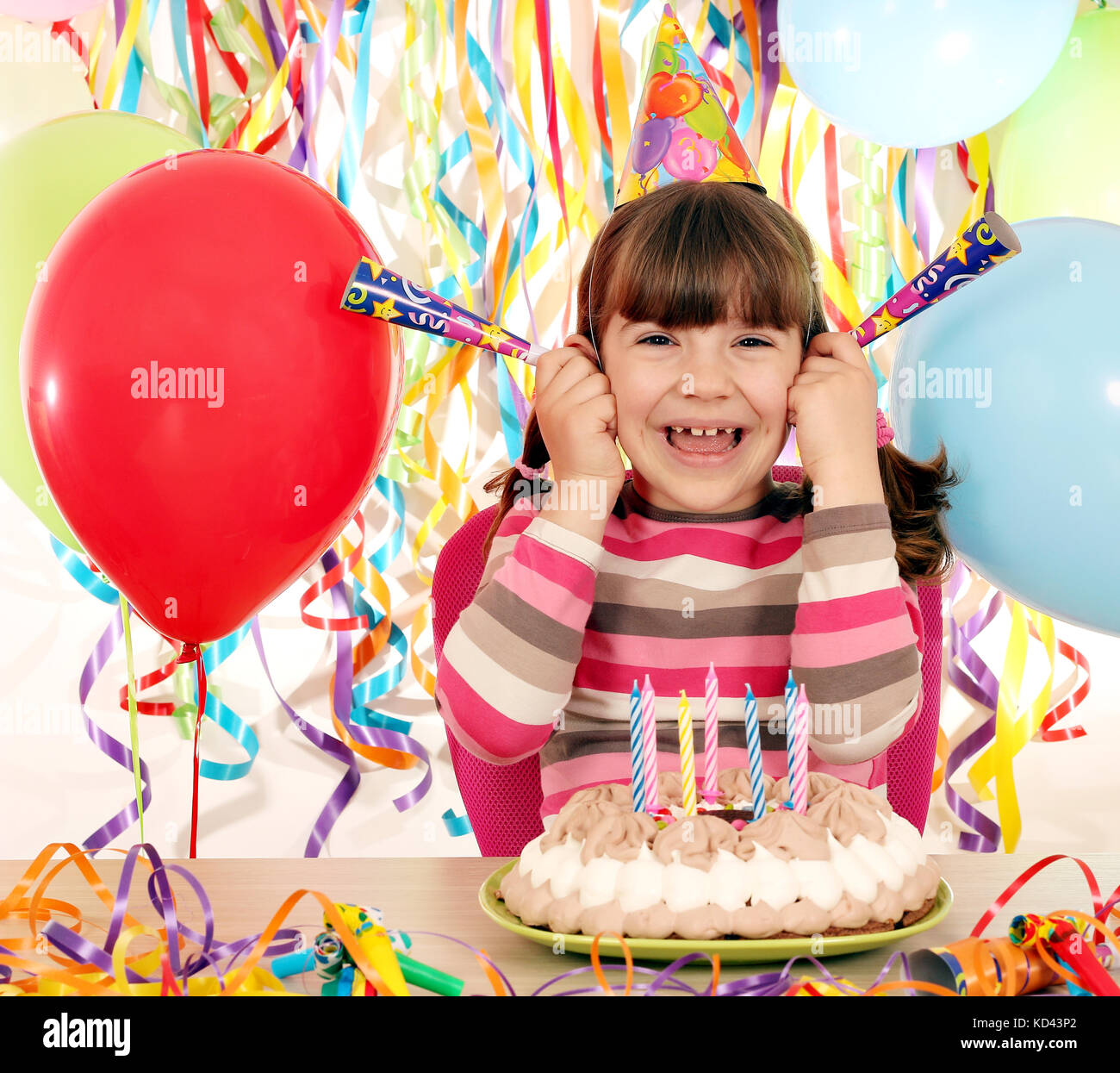 happy little girl on birthday party Stock Photo - Alamy