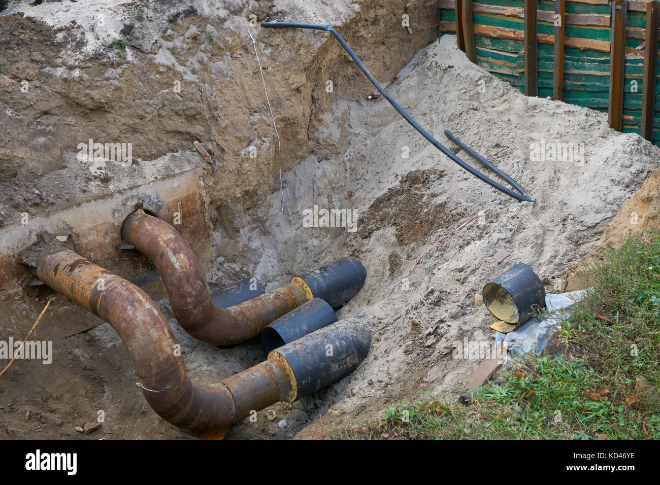 big water steel metal pvc pipes in ground pit trench ditch during