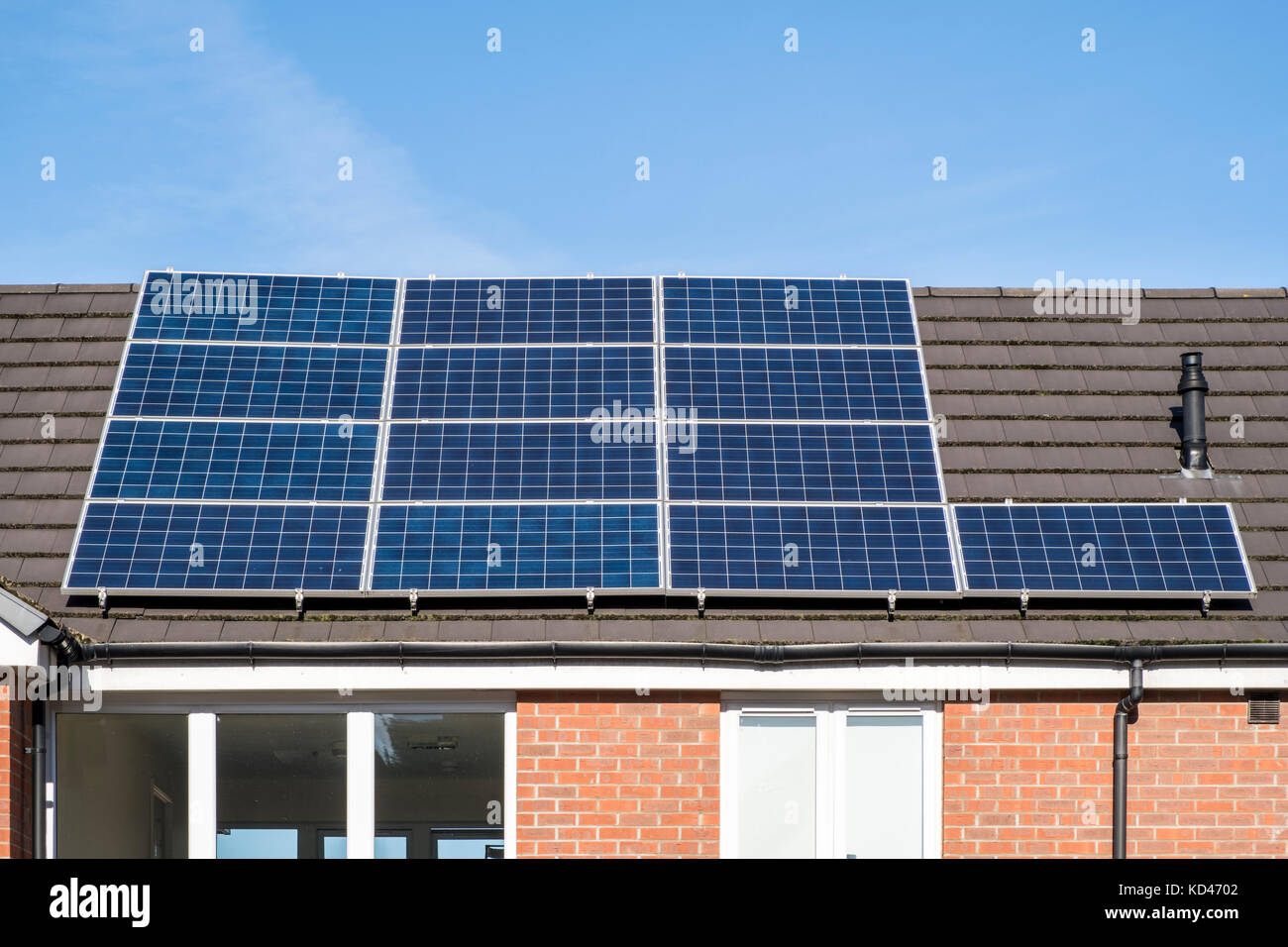 Solar panels on a house roof, Nottinghamshire, England, UK Stock Photo