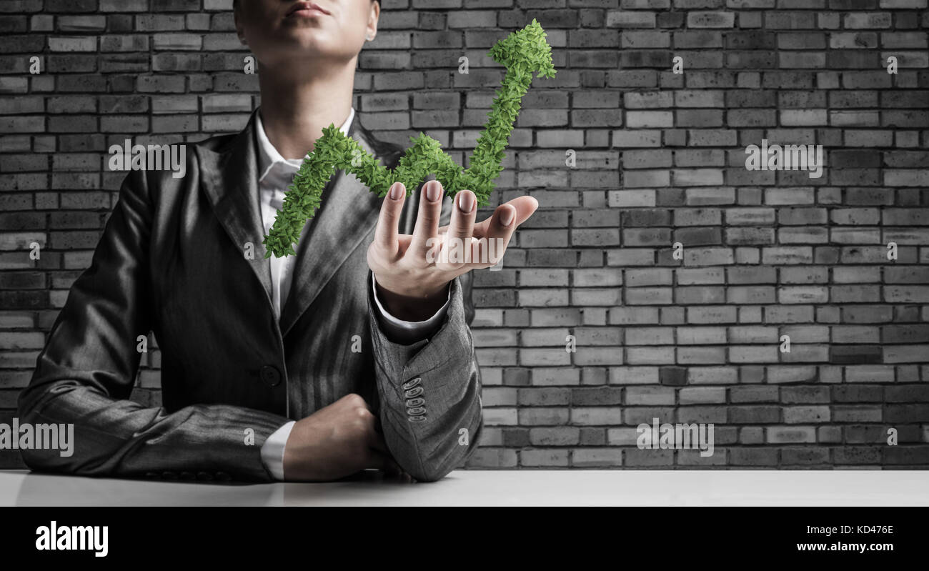 Businessman presenting growing graph Stock Photo - Alamy