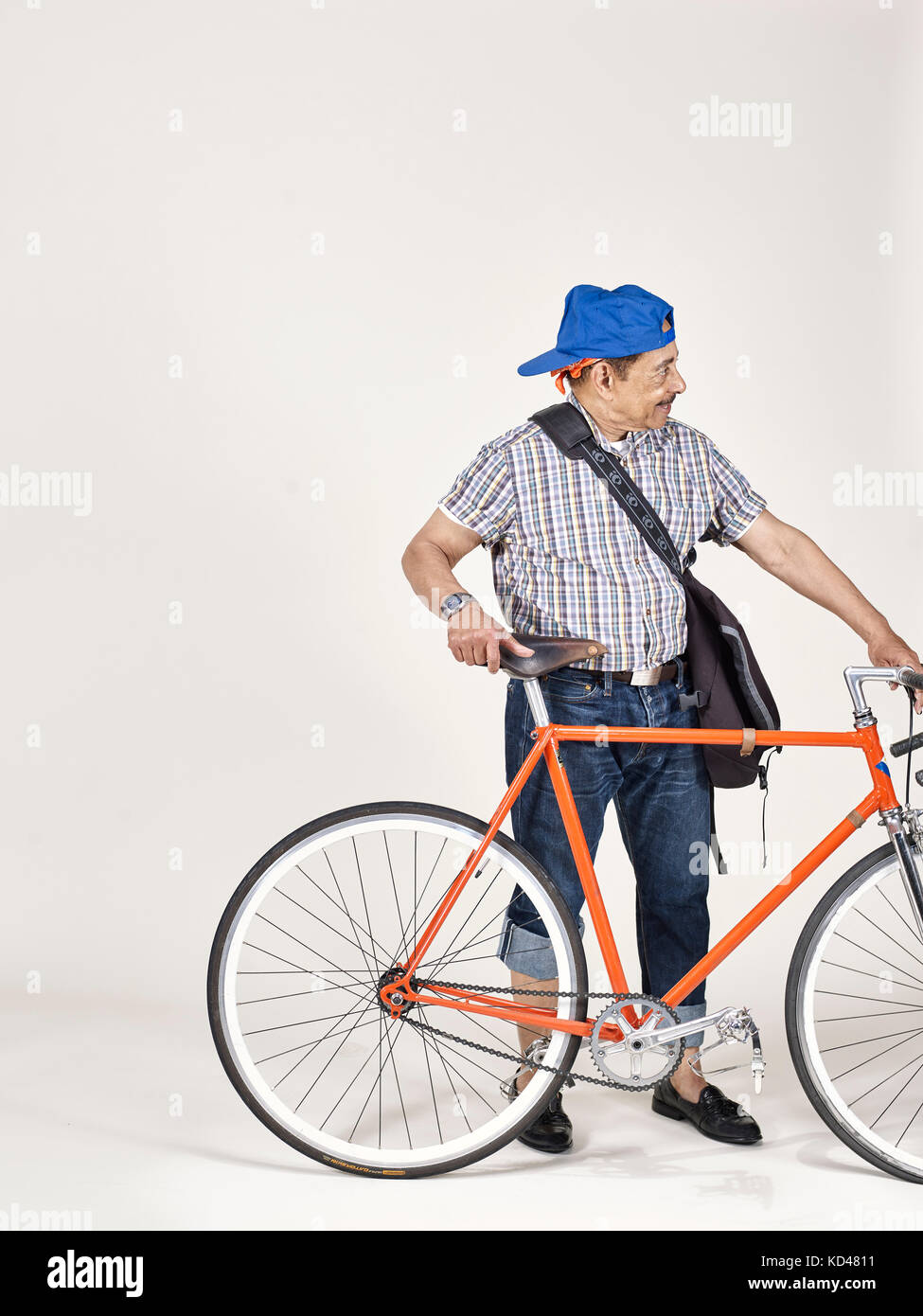 Senior Af-am man with bicycle studio portrait Stock Photo