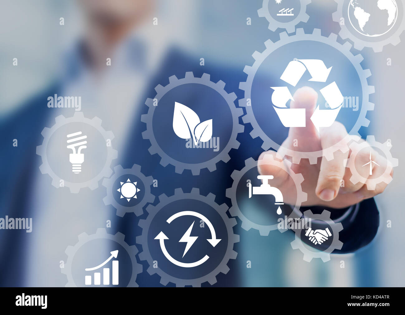 Sustainable development concept on screen with icons of renewable energy, natural resources preservation, environment protection inside connected gear Stock Photo