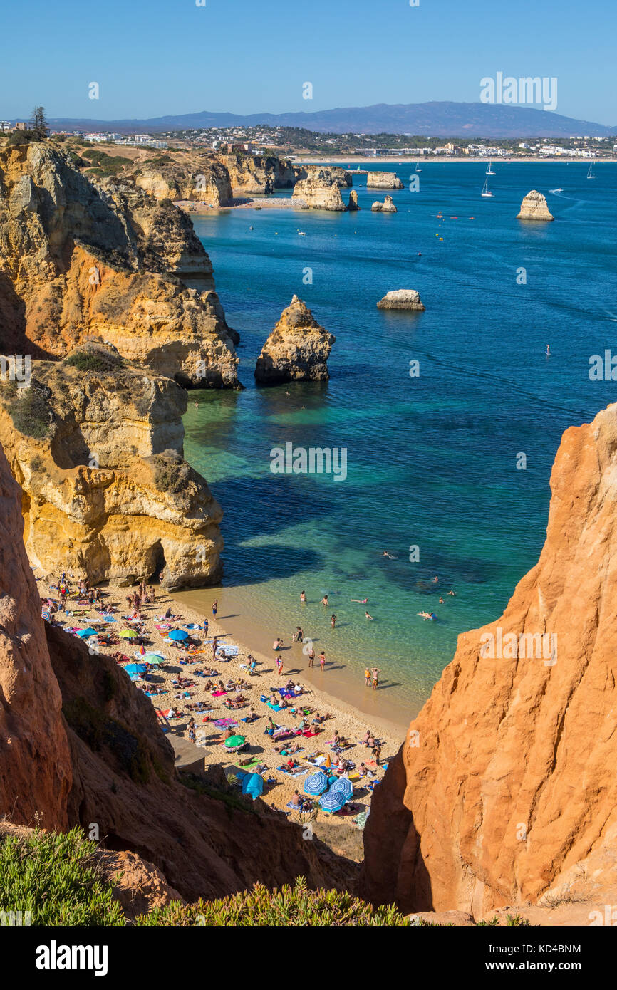 A view of the beautiful Praia do Camilo in Lagos, Portugal. Meia Praia can  been seen in the distance Stock Photo - Alamy