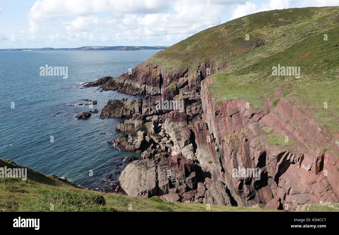 Pembrokeshire Coast Path and coastline between Presipe beach and Manorbier beach in Pembrokeshire, West Wales, Uk Stock Photo