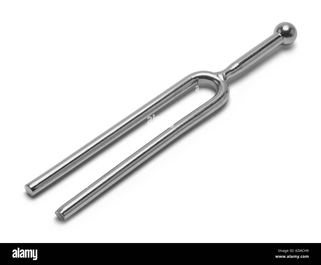 Metal Tuning Fork Isolated on a White Background. Stock Photo