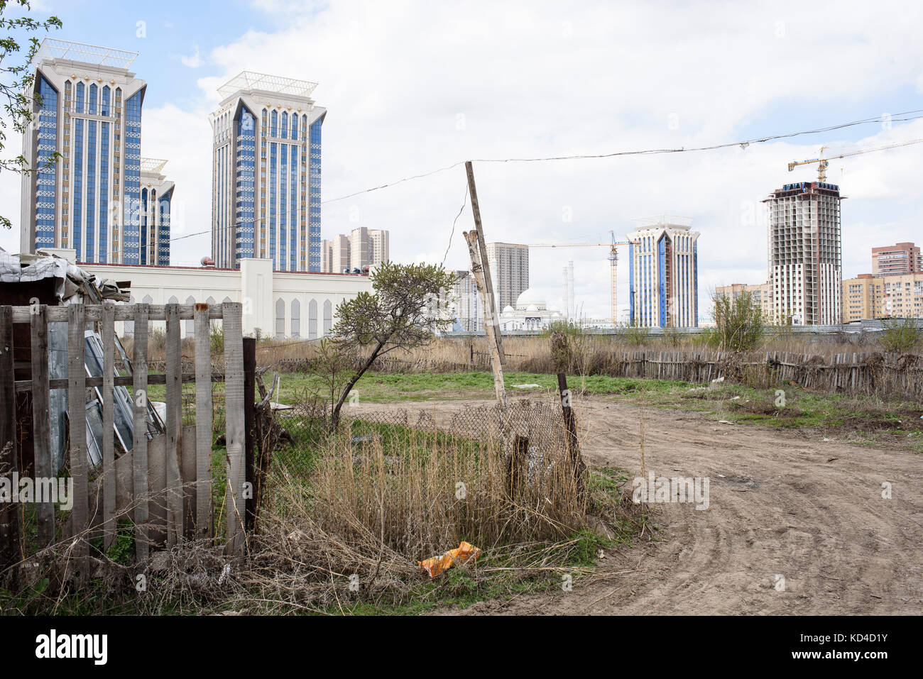 The new Astana city view from the country side. From all over around, new buildings grow very fast. The government says that they buy the fileds at th Stock Photo