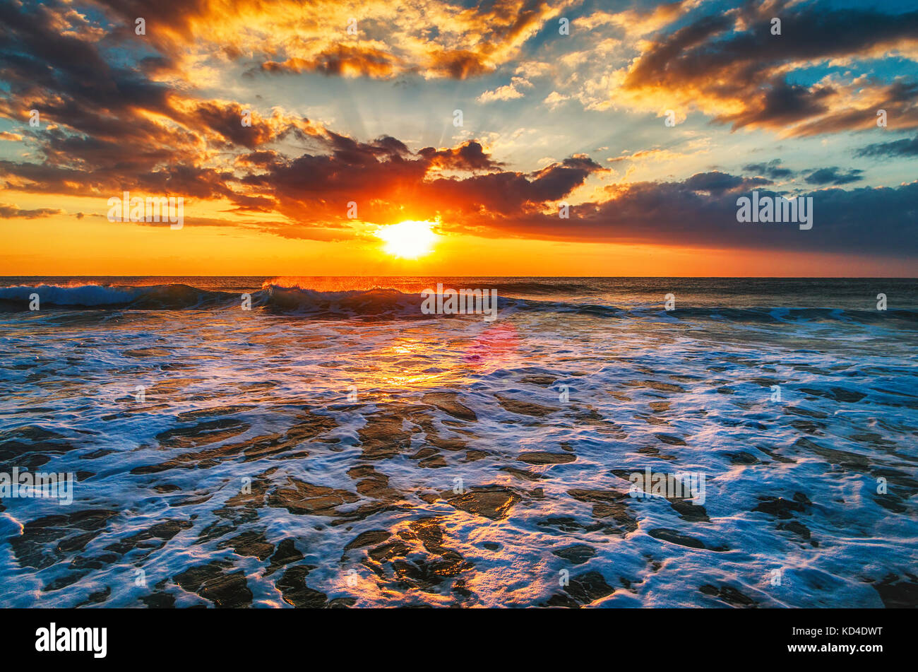 Aerial view over the sea, sunrise shot. Stock Photo