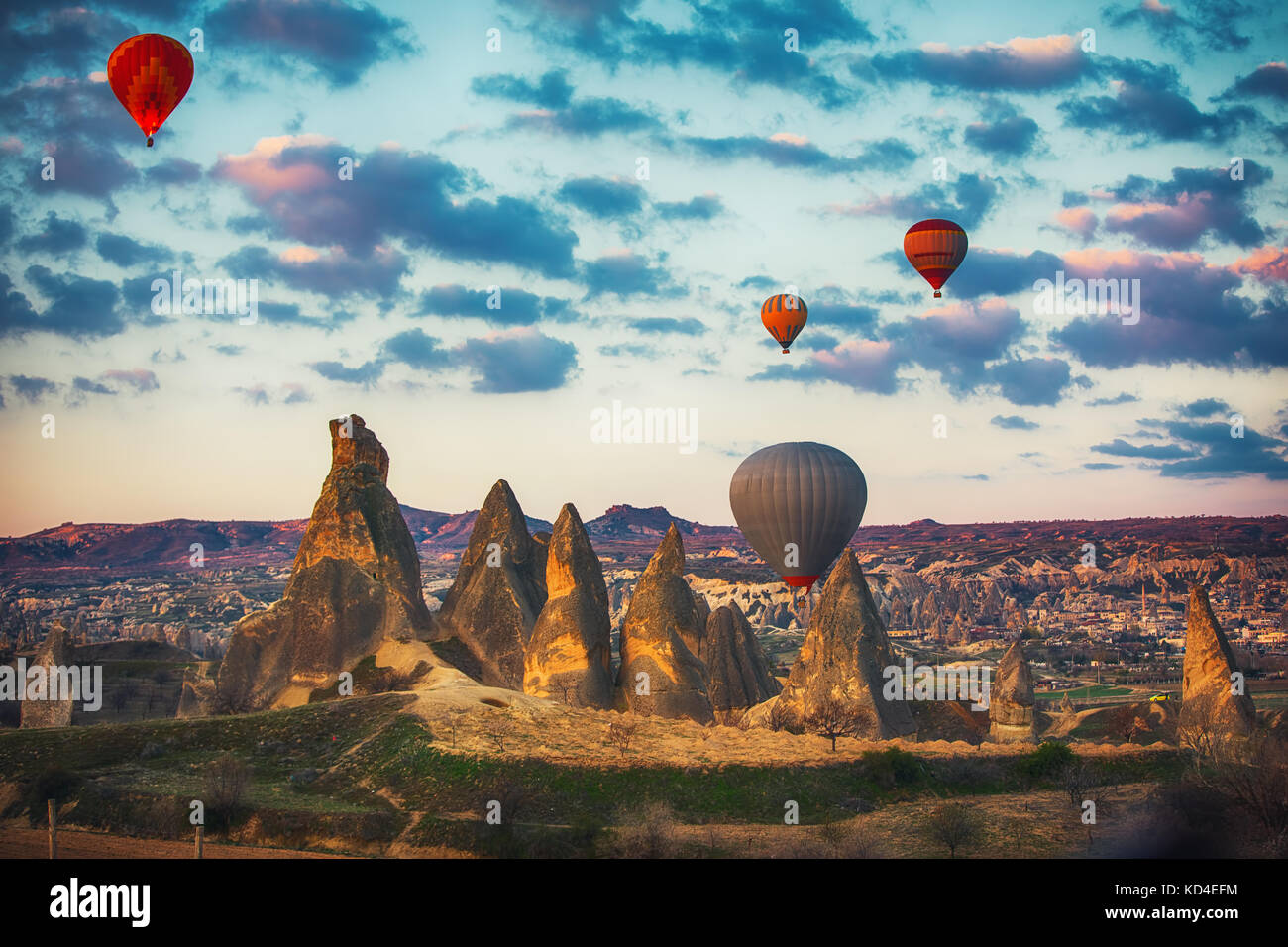 Hot air balloons flying over the valley at Cappadocia, Turkey Stock ...