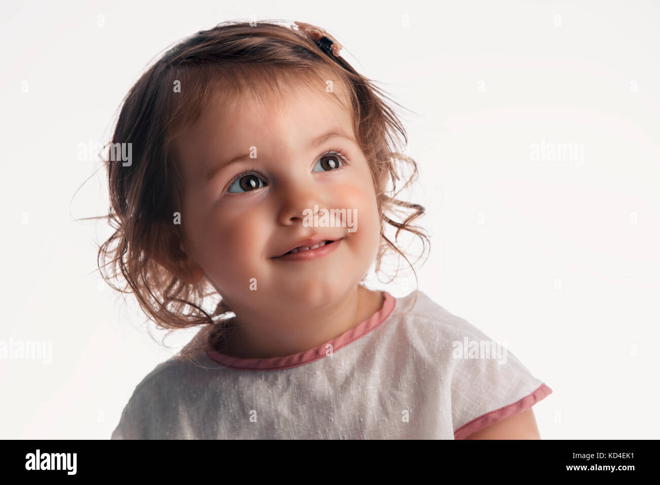 Beautiful blonde baby girl portrait on white background, studio shot Stock Photo