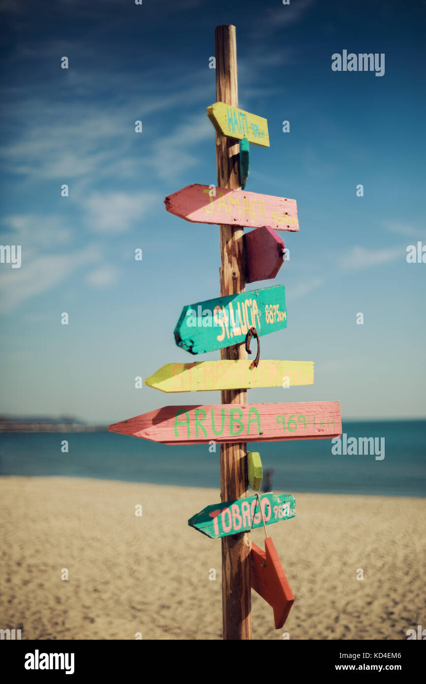 Wooden handmade signpost on the tropic beach Stock Photo - Alamy