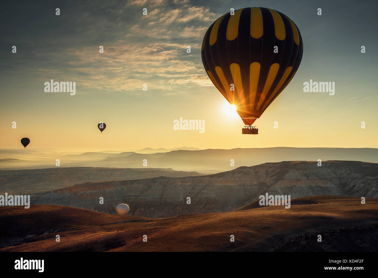 Hot air balloons flying over the valley at Cappadocia, Turkey Stock ...