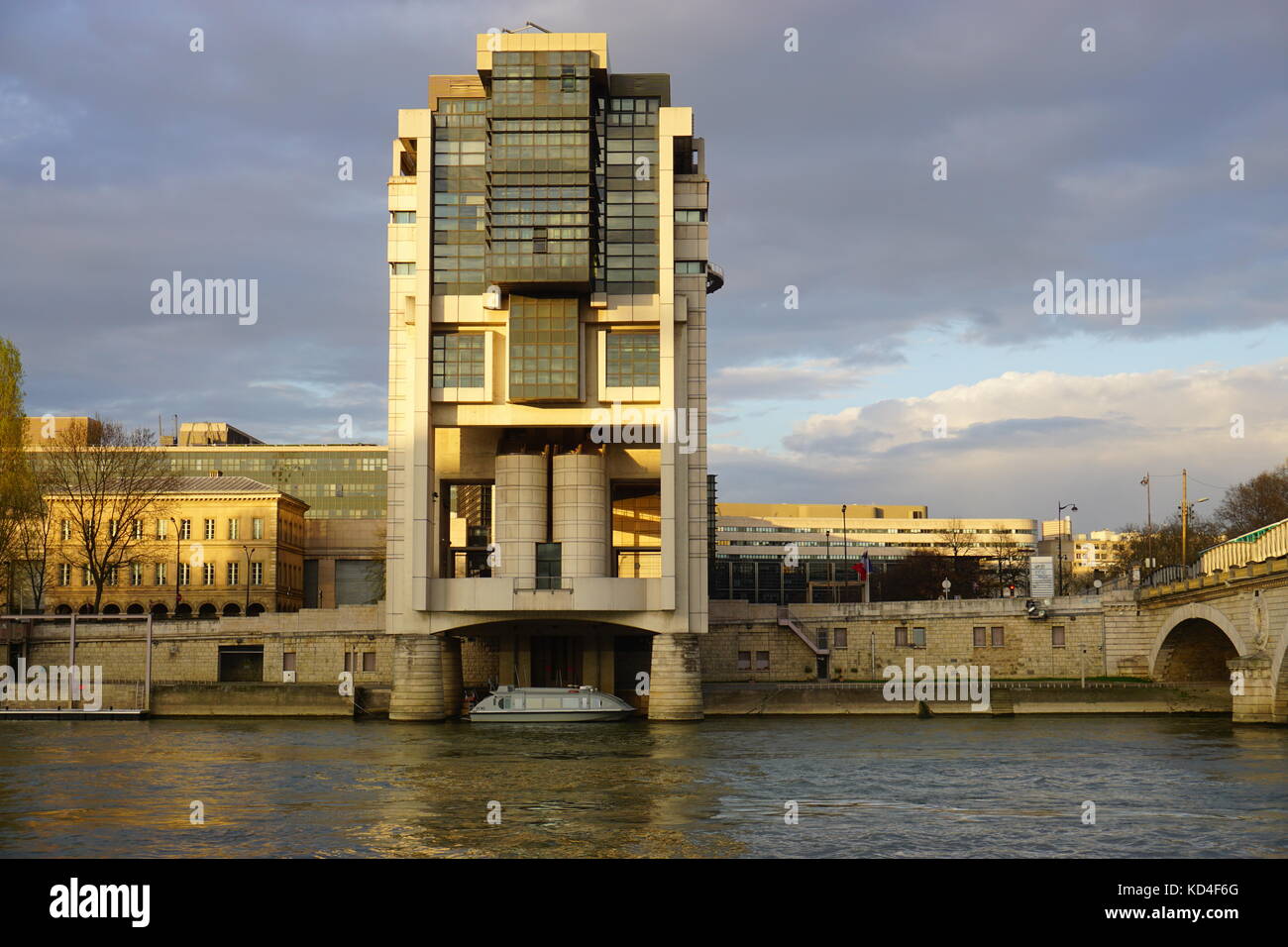 The headquarters of the French Ministry of Finance and Economy in the Bercy neighborhood in the 12th arrondissement of Paris, extending over the Seine Stock Photo