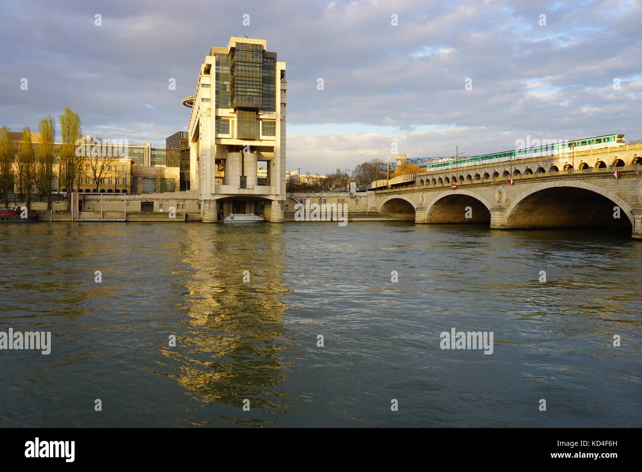 The headquarters of the French Ministry of Finance and Economy in the Bercy neighborhood in the 12th arrondissement of Paris, extending over the Seine Stock Photo