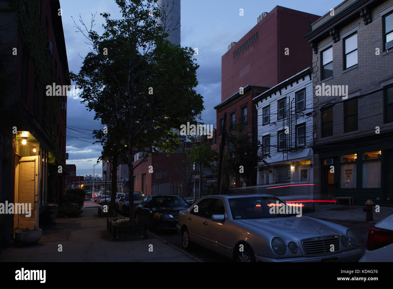 Darkness down a Vinegar Hill backstreet near DUMBO Brooklyn. Old houses