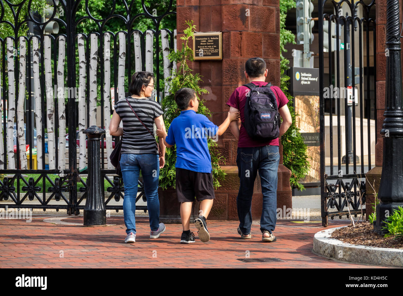 Washington DC,District of Columbia,National Mall,Enid A. Haupt Garden,gate,Asian Asians ethnic immigrant immigrants minority,adult adults man men male Stock Photo