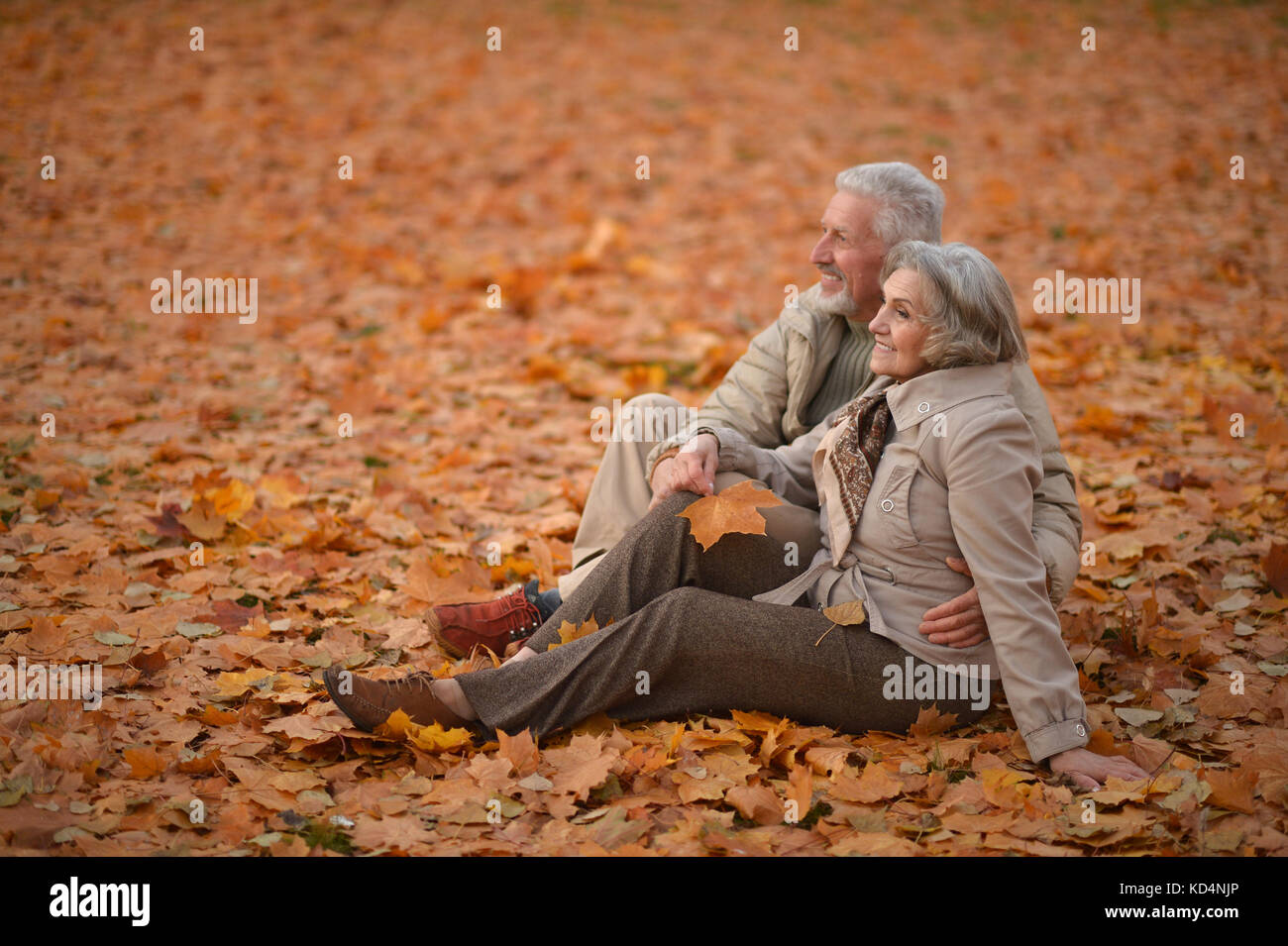 Senior couple sitting Stock Photo - Alamy